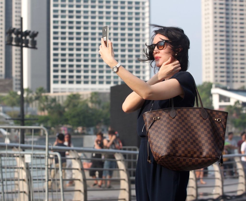 Woman using smartphone
