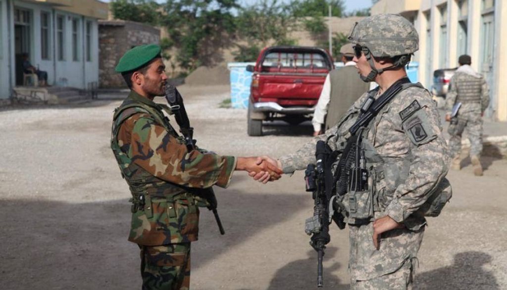 US Army shakes hands with Afghan National Army