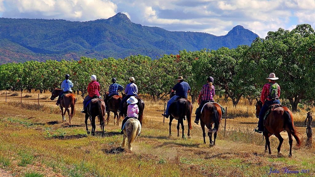 Family on horseback, Australia