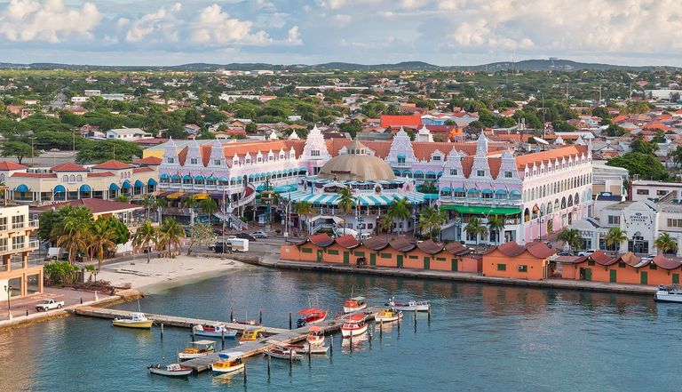 View_from_above_of_colorful_buildings_in_Oranjestad_on_the_island_of_Aruba_in_the_morning_sun.jpg